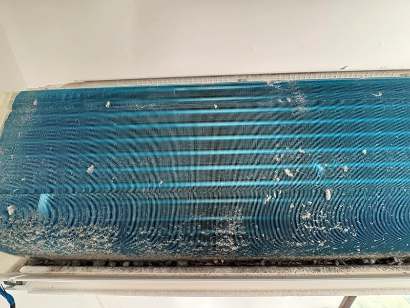 Blue heat exchanger before cleaning